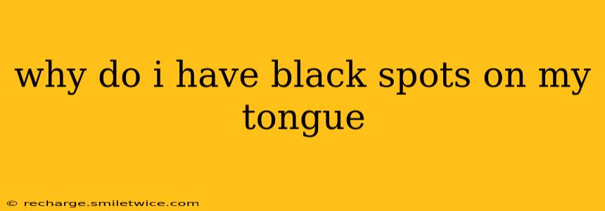 why do i have black spots on my tongue